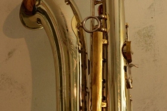 Silver plated with brass posts, ribs, and accents. Source: universalsax on eBay.de