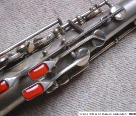 Akustik tenor #2345. Source: rechtschreibfeler on eBay.ch Akustik tenor sax, saxophone keys, orange glass key touches, full pearl version, silver plated sax, vintage German saxophone