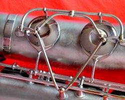 Olds Super tenor #108x silver saxophone against red background, Olds Super tenor sax, vintage American saxophone, rare saxophone, collectible saxophone,