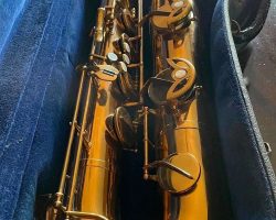 Dörfler & Jörka low Bb bari # 18xxx. Source: electricard8 on eBay.com vintage German saxophone, Dörfler & Jörka low Bb baritone sax, bow right side, key guard buttons, lacquer saxophone in its case,