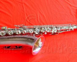 Olds Super tenor #108x silver saxophone against red background, Olds Super tenor sax, vintage American saxophone, rare saxophone, collectible saxophone,