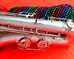 Olds Super tenor #108x silver saxophone against red background, Olds Super tenor sax, vintage American saxophone, rare saxophone, collectible saxophone,