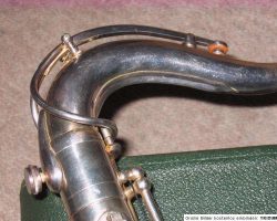 Toneking tenor # 25300. Source: eBay.de vintage German tenor saxophone, Julius Keilwerth, Toneking, left side detailed view of neck fastening screw attached to neck, silver plated horn
