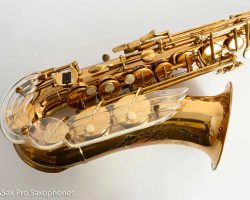 The New King alto #38431. Source: getasax.com vintage German saxophone, Julius Keilwerth, The New King, saxophone keys, angel wing key guard made of Lucite, lacquer horn on white background