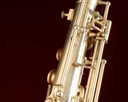 Toneking tenor #28034. Source: Randy Cole on reverb.com vintage German saxophone, Julius Keilwerth, Toneking, octave mechanism, silver plated horn against dark red background