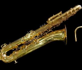 Source: saxquest.com bass saxophone, P. Mauriat, PM-350, gold lacquer bass sax, short wrap bass saxophone, French wrap