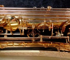 Source: saxquest.com bass saxophone, P. Mauriat, PM-350, gold lacquer bass sax, short wrap bass saxophone, French wrap