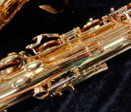 Source: saxquest.com bass saxophone, P. Mauriat, PM-350, gold lacquer bass sax, short wrap bass saxophone, French wrap, left palm keys
