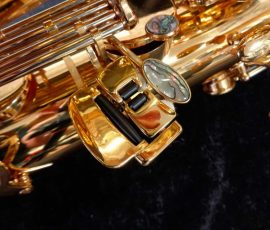 Source: saxquest.com bass saxophone, P. Mauriat, PM-350, gold lacquer bass sax, short wrap bass saxophone, French wrap, left pinkie cluster