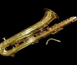 Source: saxquest.com bass saxophone, P. Mauriat, PM-350, gold lacquer bass sax, short wrap bass saxophone, French wrap