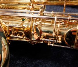 Source: saxquest.com bass saxophone, P. Mauriat, PM-350, gold lacquer bass sax, short wrap bass saxophone, French wrap