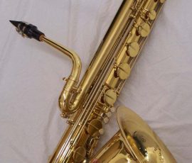 Source: International Woodwind Inc. International Woodwind bass saxophone, Jinyin-made bass saxophone, long wrap bass, stencil sax, Chinese bass sax, vintage American style, Conn New Wonder bass sax copy