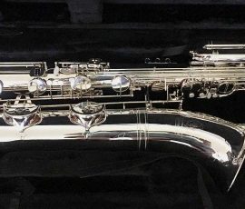 Source: saxophonedepot on eBay.com International Woodwinds Model 661 bass saxophone, silver plated bass sax, Jinbao-made bass saxophone, short wrap bass, stencil sax, Chinese bass sax, Super Action 80 Series II copy,