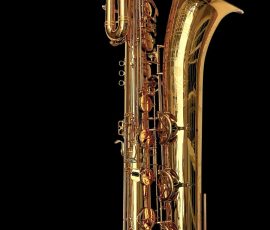 Source: pmauriat.com bass saxophone, P. Mauriat, PM-350, gold lacquer bass sax, short wrap bass saxophone, French wrap