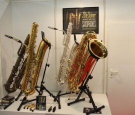Source: eBay.com J'Elle Stainer bass saxophone, Jinbao-made bass saxophone, short wrap bass, stencil sax, Chinese bass sax, Super Action 80 Series II copy, vintage finish, lacquer finish, silver plate, compact contrabass saxophone