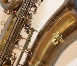 Source: eBay.com J'Elle Stainer bass saxophone, Jinbao-made bass saxophone, short wrap bass, stencil sax, Chinese bass sax, Super Action 80 Series II copy, vintage finish
