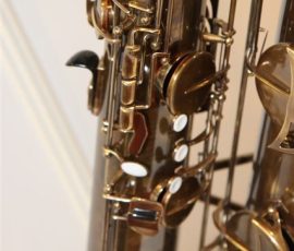 Source: eBay.com J'Elle Stainer bass saxophone, Jinbao-made bass saxophone, short wrap bass, stencil sax, Chinese bass sax, Super Action 80 Series II copy, vintage finish
