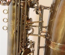 Source: eBay.com J'Elle Stainer bass saxophone, Jinbao-made bass saxophone, short wrap bass, stencil sax, Chinese bass sax, Super Action 80 Series II copy, vintage finish
