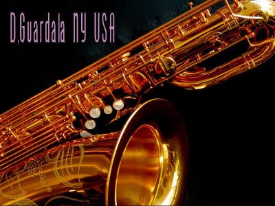 Serial # unknown. Source: soundfuga.jp low A bari sax, Dave Guardala Artist Series baritone saxophone, floral engraving, lacquer saxophone