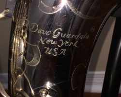 Dave Guardala tenor #360230 Made in China or Taiwan. Source: A Friend of Bassic Sax Dave Guardala tenor sax, Asian-made saxophone, black nickel silver key work,