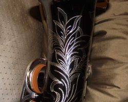 Serial # 012xxx. Source: gbyrd33 on SOTW.net DG400BN Alto Sax, Dave Guardala alto saxophone, floral engraving, black nickel plated with silver plated keys, B&S