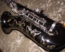 Serial # 012xxx. Source: gbyrd33 on SOTW.net DG400BN Alto Sax, Dave Guardala alto saxophone, floral engraving, black nickel plated with silver plated keys, B&S