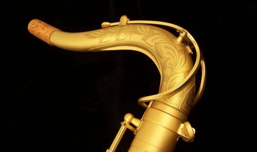 Earth Tone tenor #015149. Source: Dave Kessler DG-503ET tenor sax, Dave Guardala tenor saxophone, B&S, matt gold finish with gold lacquer inner bell, extensive floral engraving all over