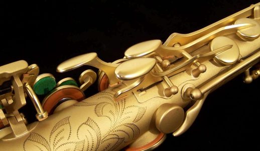 Earth Tone tenor #015149. Source: Dave Kessler DG-503ET tenor sax, Dave Guardala tenor saxophone, B&S, matt gold finish with gold lacquer inner bell, extensive floral engraving all over